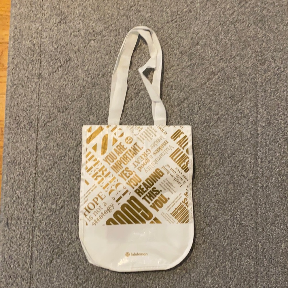 Gold and White Lululemon Bag